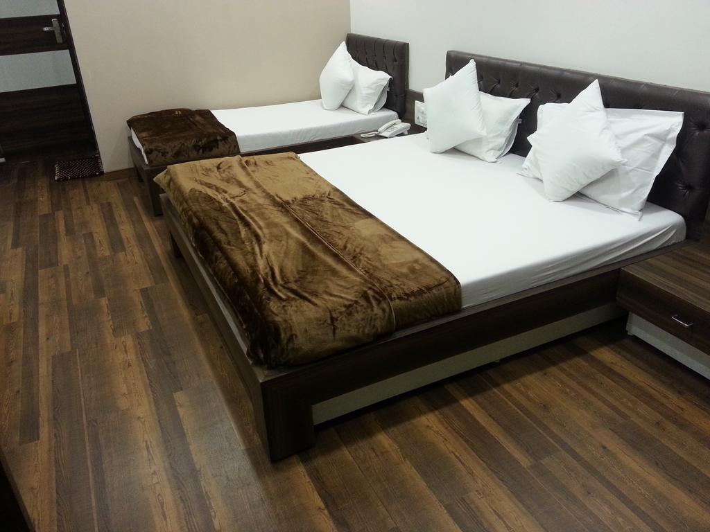 Hotel Oasis Mumbai Zimmer foto