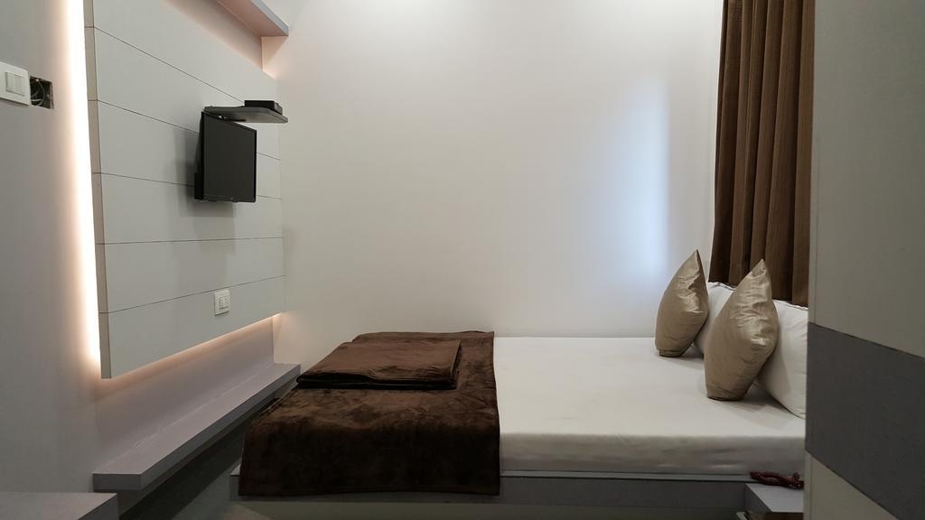 Hotel Oasis Mumbai Zimmer foto